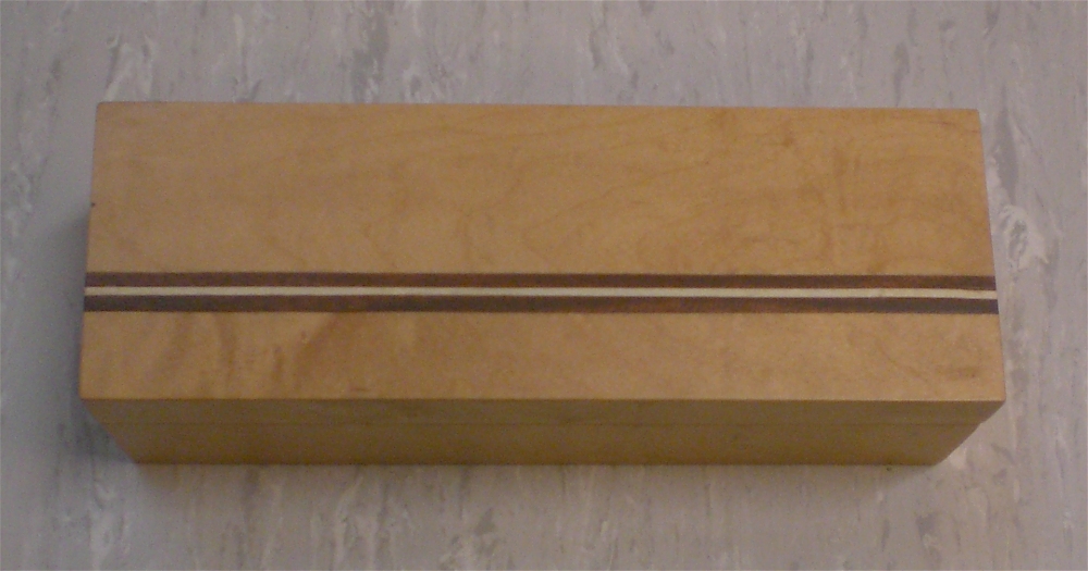 Coffret en érable moucheté - filet acajou et bouleau